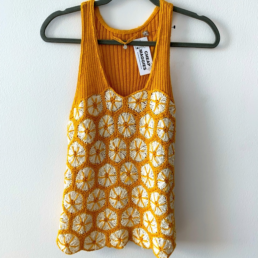 Its a kind of summer crop top which has a zip to the side, its size is xs.